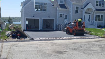 Asphalt driveway being installed
