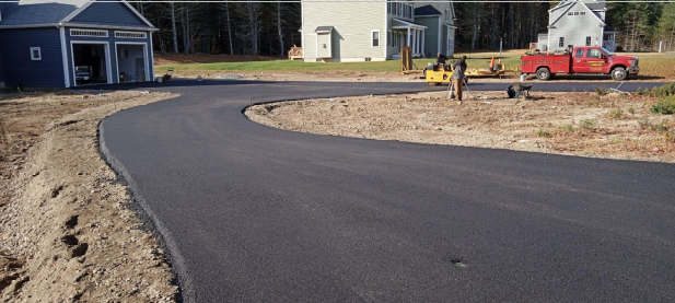 a freshly paved driveway