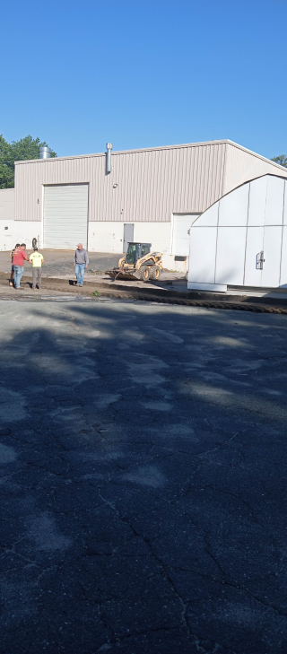 an asphalt-paved parking area