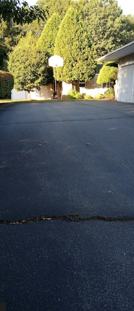 Freshly paved asphalt road with a properly prepared foundation